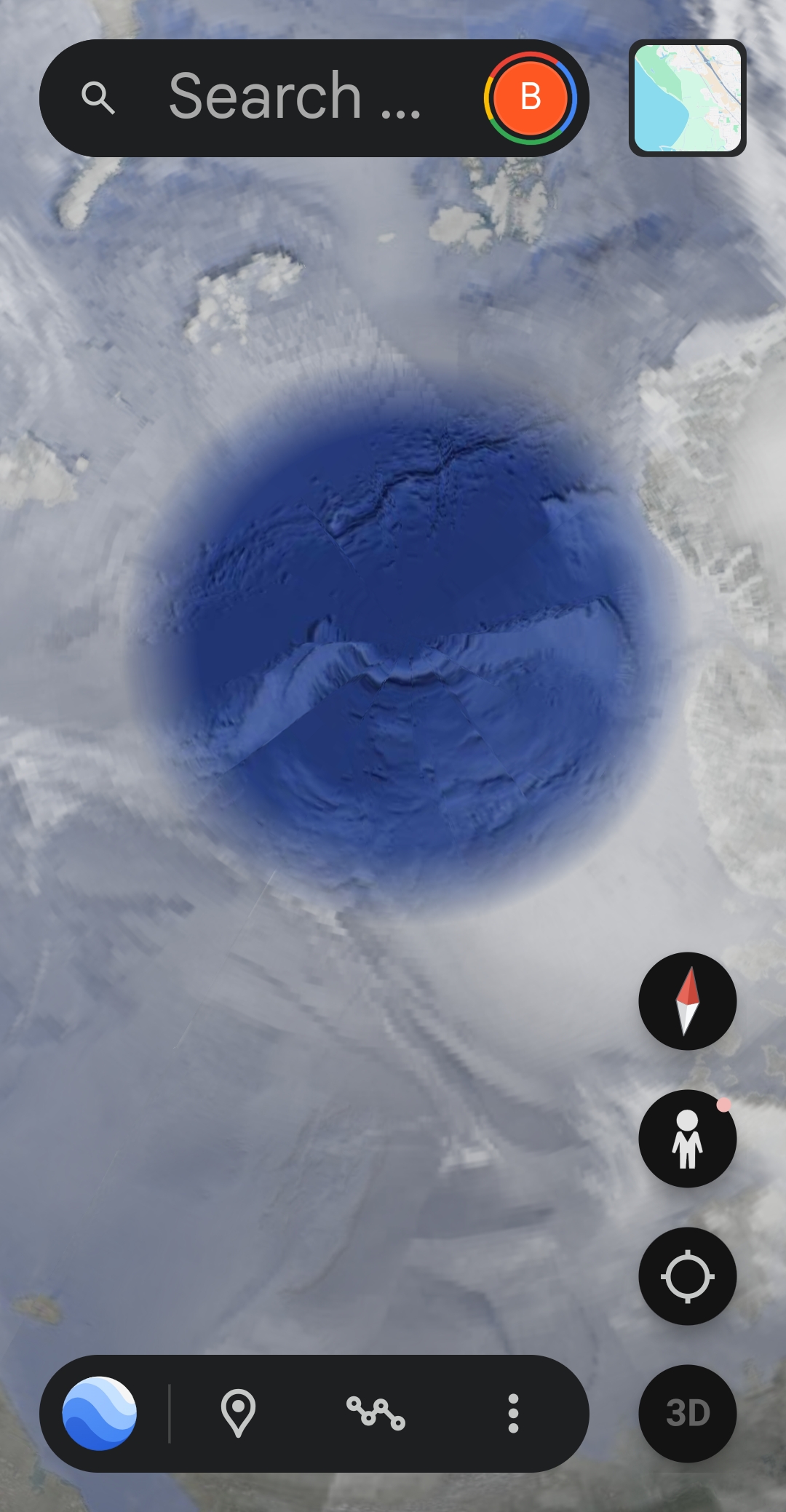 High-resolution Google Earth satellite capture of the Greenland off-coast Epicenter coordinate showing dense gray-white cloud cover across the entire frame with a perfectly circular cloud-cleared opening revealing a deep blue ocean depression at the center indicating a heat signature column rising from below sea level and parting the cloud cover directly above