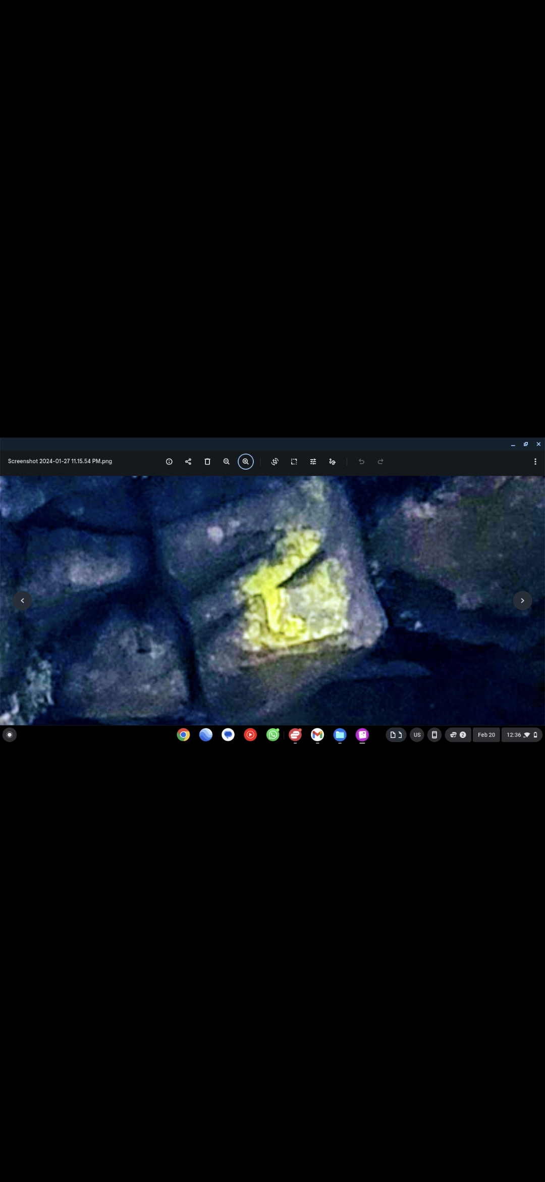 Glowing golden luminescent guardian entity on volcanic rocks portal protector