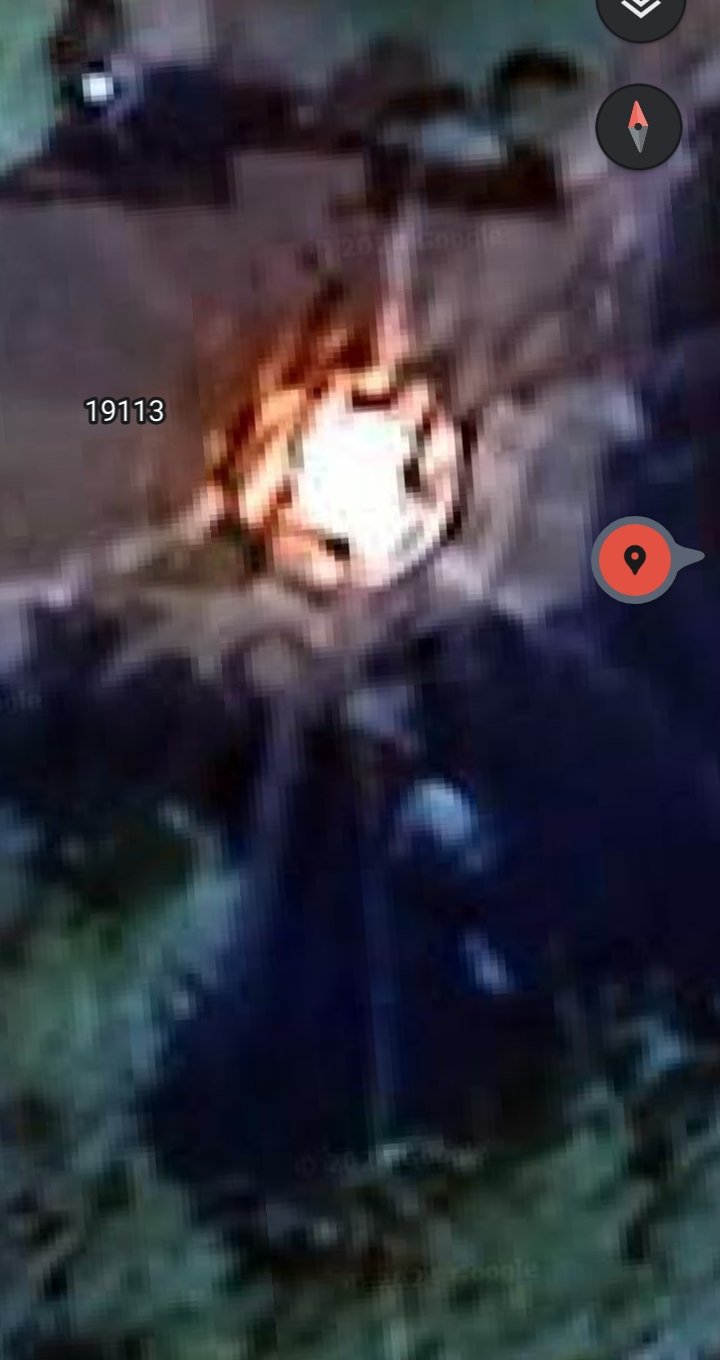 Zoomed close-up of the active UAP landing thermal signature on the rooftop at 19113 SE 45th Street Issaquah Washington showing intense luminous burn pattern signature