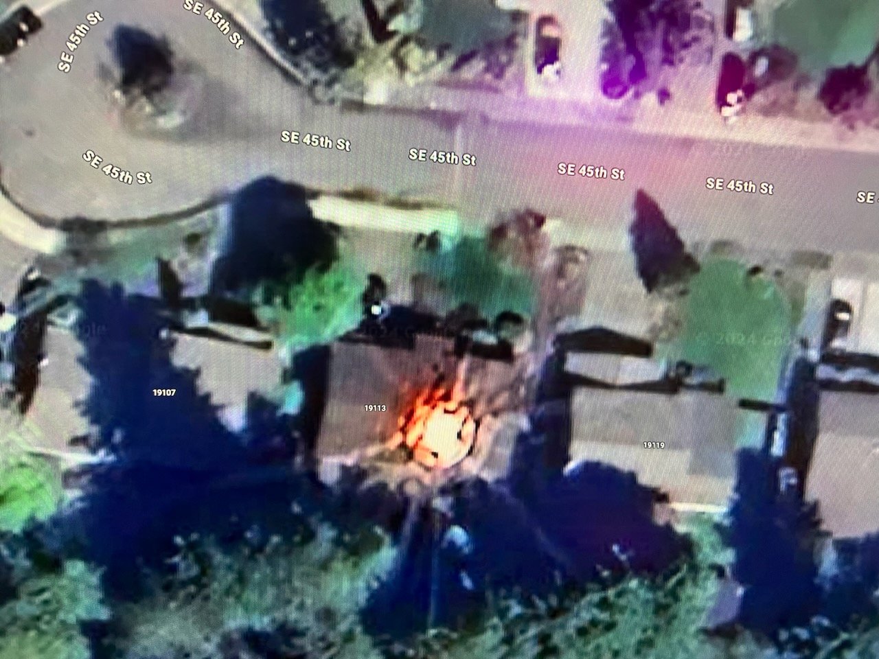 Aerial infrared satellite view of SE 45th Street Issaquah Washington showing two active UAP landing thermal signatures on residential rooftops at addresses 19107 19113 19119
