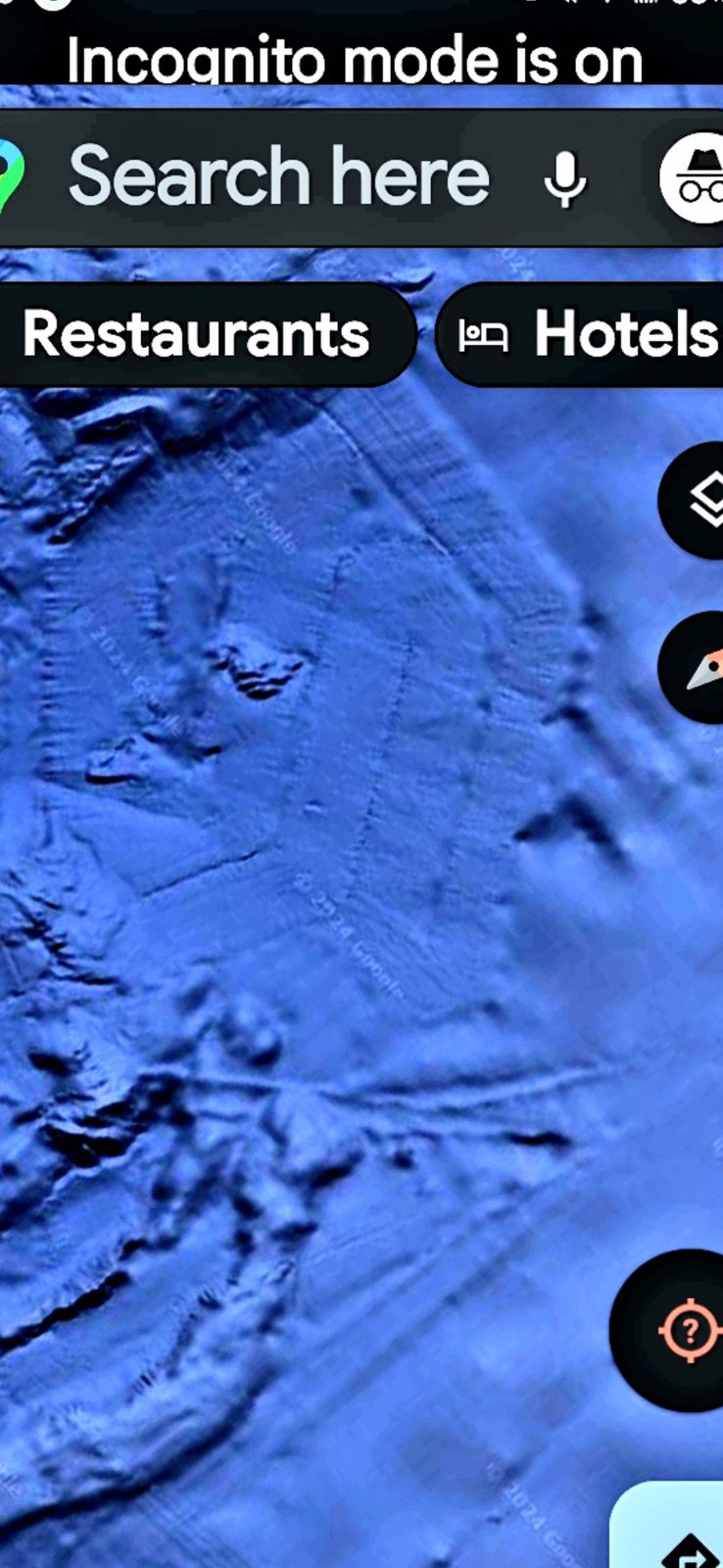 Pacific seafloor off Mazatlán Mexico showing what reads as half of a massive hexagonal geometric formation visible from Google Maps satellite imagery in incognito mode with straight ridge edges meeting at angled vertices inconsistent with natural seamount morphology