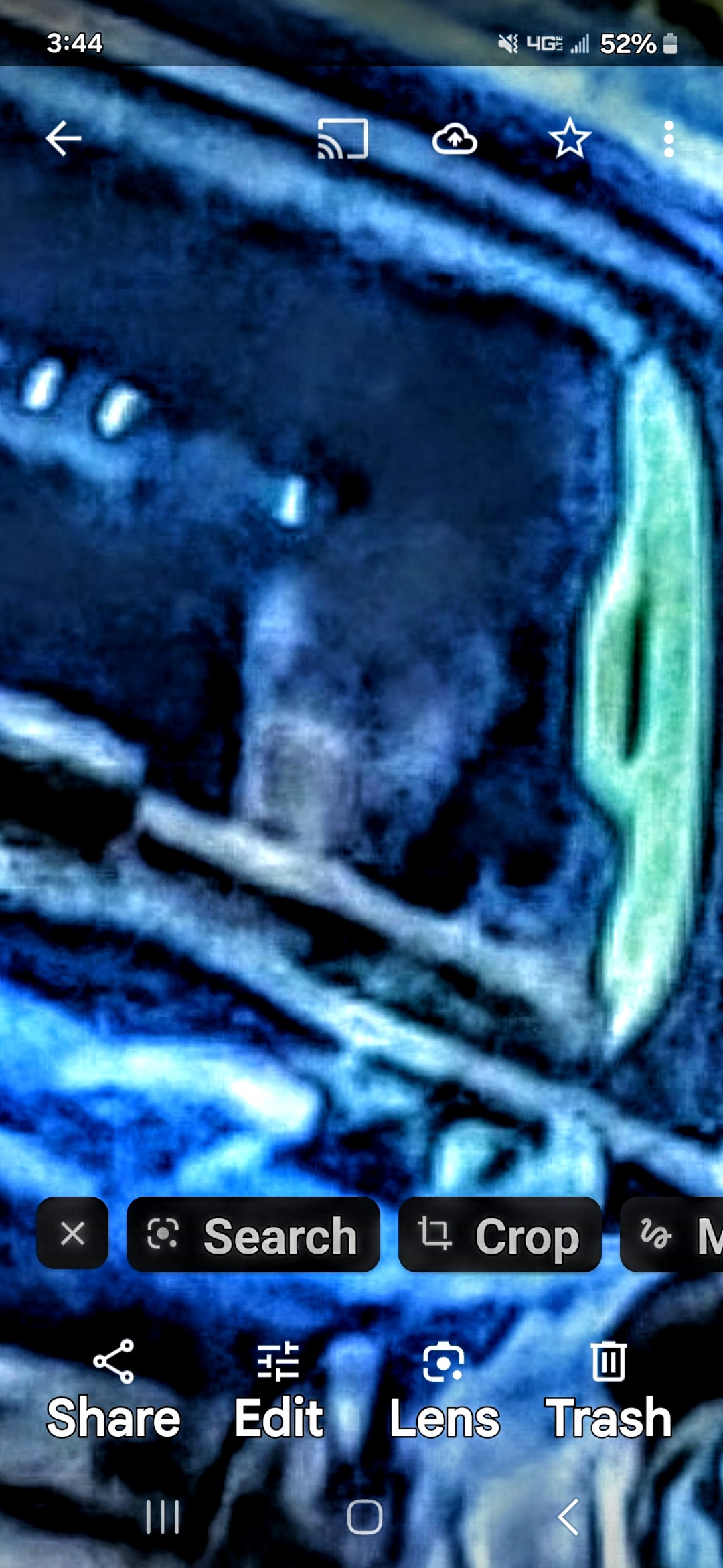 Clearer blue-filter zoomed capture of the reptilian entity driving a Suburban - actively following and surveilling the Perceiver