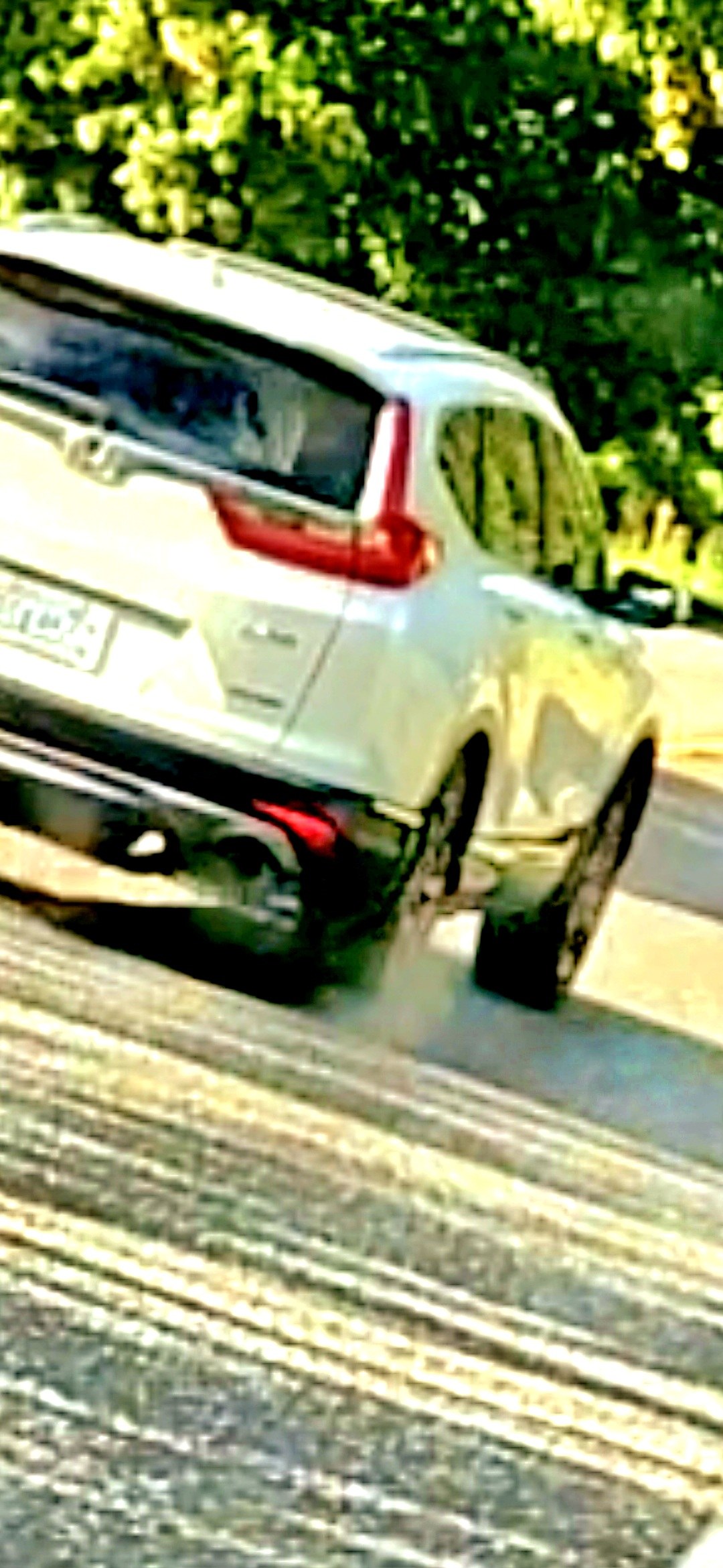 The pursuit vehicle on Highway 14 carrying the female reptilian entities documented during the encounter