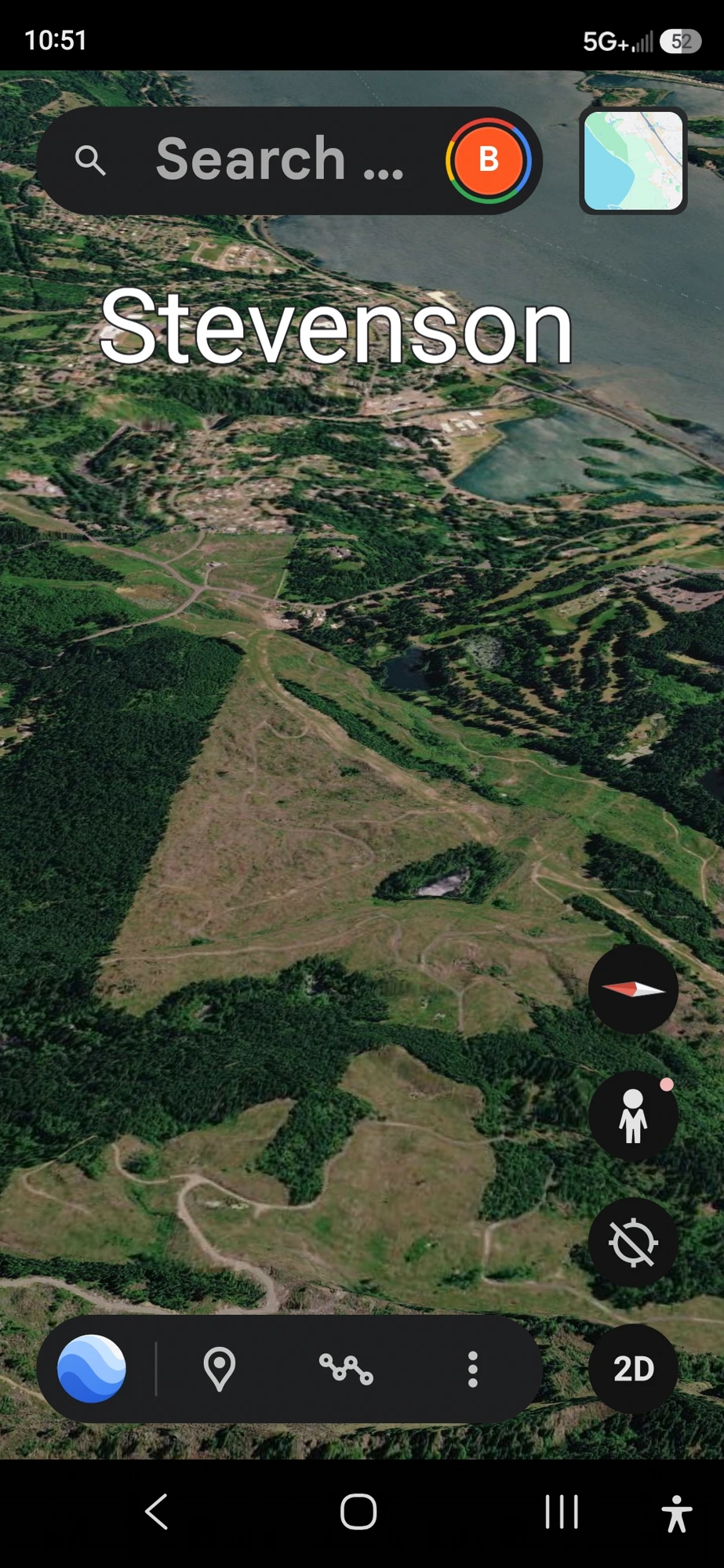 Google Earth 3D terrain view showing a forested depression south of Stevenson with a visible ground opening in the tree canopy — one of the two ground vents